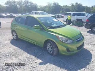 2012 Hyundai Accent GS with VIN KMHCT5AE9CU057639, listed as a IAAI auction lot 42571235 with 216,615 mi miles and . Bid and sale history available at DreamBid. Image 1.