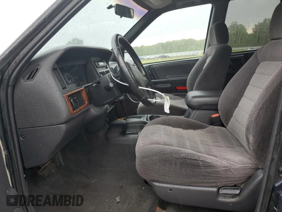 1998 Jeep Grand Cherokee Laredo with VIN 1J4GZ58SXWC144437, listed as a Copart auction lot 60437094 with 183,908 mi miles and Salvage Title. Bid and sale history available at carsss.com. Image 7.