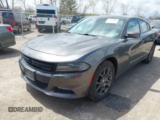 2018 Dodge Charger GT with VIN 2C3CDXJG2JH330696, listed as a IAAI auction lot 42085981 with 113,155 mi miles. Bid and sale history available at carsss.com. Image 2.