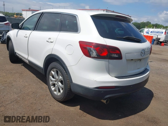 2014 Mazda CX-9 Touring z VIN JM3TB3CV7E0426900, wystawiony jako IAAI lot #42796725 z przebiegiem Nie podano mil oraz . Historia ofert i sprzedaży dostępna na DreamBid. Obrazek 3.
