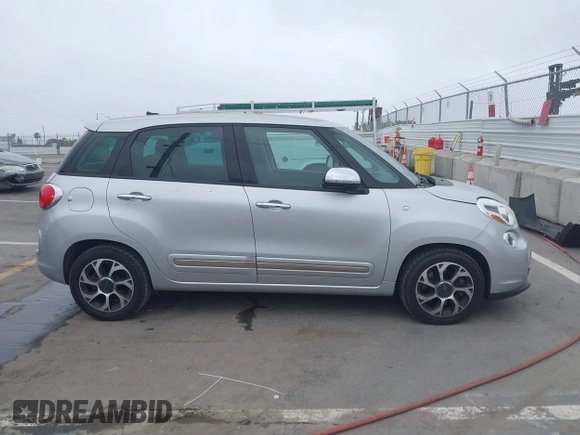 2014 FIAT 500L Lounge with VIN ZFBCFACH8EZ005035, listed as a IAAI auction lot 41824368 with 80,914 mi miles and . Bid and sale history available at DreamBid. Image 13.