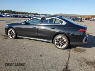 2024 BMW 5 Series 530i xDrive with VIN WBA53FJ00RCS00741, listed as a Copart auction lot 84899434 with 7,103 mi miles and Salvage Title. Bid and sale history available at carsss.com. Image 2.