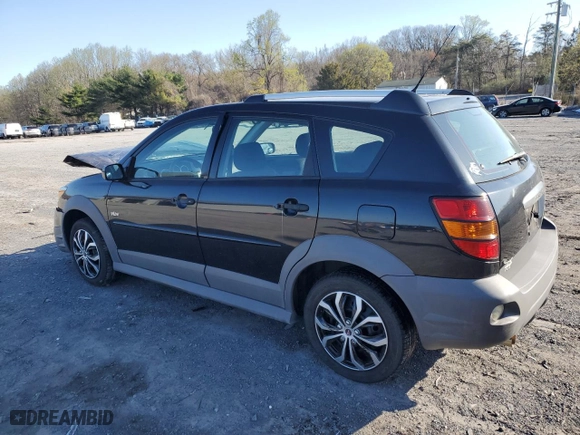 2005 Pontiac Vibe with VIN 5Y2SL63825Z476581, listed as a Copart auction lot 52519825 with 128,550 mi miles and Salvage Title. Bid and sale history available at carsss.com. Image 2.