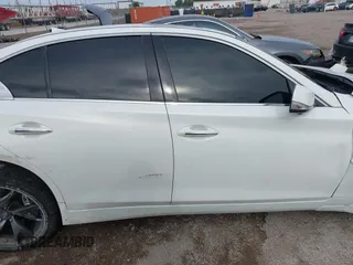 2015 Infiniti Q50 Premium z VIN JN1BV7APXFM352327, wystawiony jako IAAI lot #42367983 z przebiegiem 110 636 mil mil oraz . Historia ofert i sprzedaży dostępna na DreamBid. Obrazek 13.