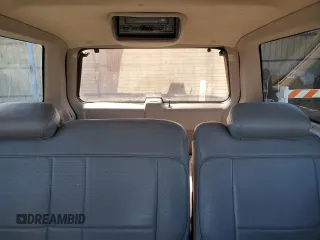 1997 Mercury Mountaineer z VIN 4M2DU52P5VUJ58731, wystawiony jako Copart lot #69710404 z przebiegiem 266 522 mil mil oraz Tytuł czysty. Historia ofert i sprzedaży dostępna na DreamBid. Obrazek 10.