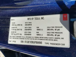 2018 Tesla Model 3 Long Range Battery z VIN 5YJ3E1EB0JF064945, wystawiony jako IAAI lot #42198286 z przebiegiem 35 112 mil mil oraz . Historia ofert i sprzedaży dostępna na DreamBid. Obrazek 9.