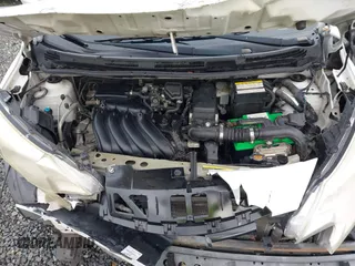 2015 Nissan Note SV with VIN 3N1CE2CP8FL371084, listed as a IAAI auction lot 41030028 with 101,301 mi miles and . Bid and sale history available at DreamBid. Image 10.