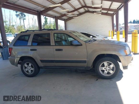 2005 Jeep Grand Cherokee Laredo with VIN 1J4GR48K05C619957, listed as a IAAI auction lot 42626093 with 279,017 mi miles and . Bid and sale history available at DreamBid. Image 13.