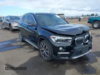 2017 BMW X1 sDrive28i with VIN WBXHU7C3XHP924635, listed as a IAAI auction lot 41744824 with 74,143 mi miles. Bid and sale history available at carsss.com. Image 1.