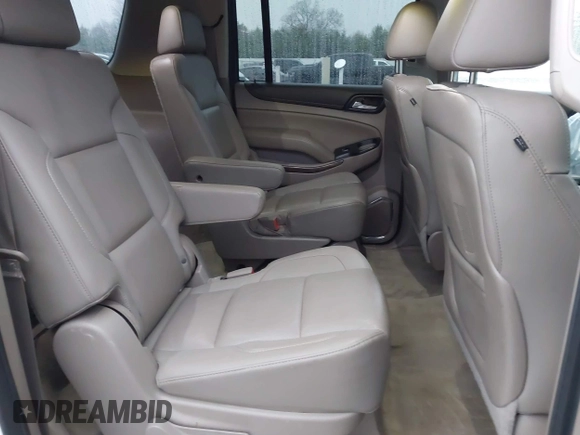 2015 GMC Yukon XL SLT with VIN 1GKS1HKC7FR223513, listed as a IAAI auction lot 40822575 with 128,239 mi miles. Bid and sale history available at carsss.com. Image 8.