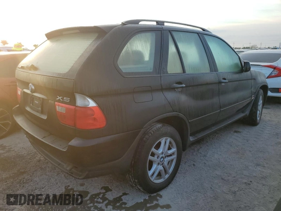 2004 BMW X5 3.0i with VIN 5UXFA13514LU25640, listed as a Copart auction lot 74727494 with 83,061 mi miles and Salvage Title. Bid and sale history available at carsss.com. Image 3.