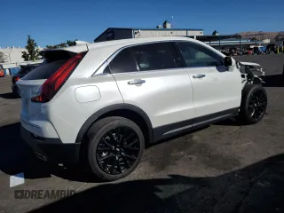 2021 Cadillac XT4 FWD Luxury z VIN 1GYAZAR49MF081955, wystawiony jako Copart lot #76611074 z przebiegiem 34 635 mil mil oraz Szkoda całkowita • Salvage title. Historia ofert i sprzedaży dostępna na DreamBid. Obrazek 3.