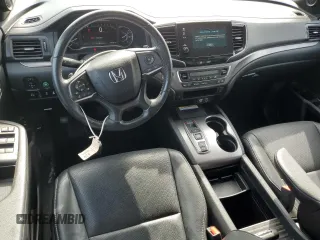 2023 Honda Passport EX-L with VIN 5FNYF8H58PB024039, listed as a Copart auction lot 57269725 with 44,705 mi miles and Salvage title. Bid and sale history available at DreamBid. Image 8.