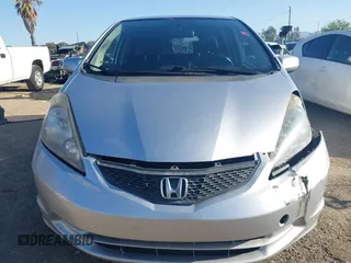 2013 Honda Fit with VIN JHMGE8H39DC055353, listed as a IAAI auction lot 41986501 with 159,569 mi miles. Bid and sale history available at carsss.com. Image 12.