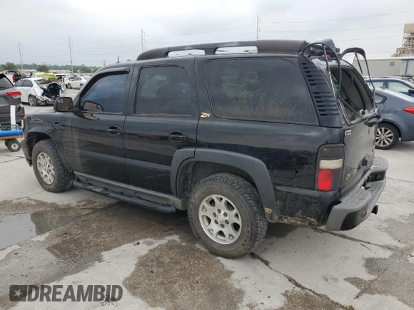 2003 Chevrolet Tahoe Z71 with VIN 1GNEK13Z63R160102, listed as a Copart auction lot 55401874 with 219,194 mi miles and Salvage Title. Bid and sale history available at carsss.com. Image 2.