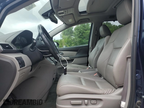 2014 Honda Odyssey EX-L with VIN 5FNRL5H61EB114764, listed as a Copart auction lot 61189305 with 167,185 mi miles and Clean title. Bid and sale history available at DreamBid. Image 7.