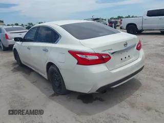 2016 Nissan Altima SR with VIN 1N4AL3AP7GC248981, listed as a IAAI auction lot 42324092 with 266,215 mi miles and . Bid and sale history available at DreamBid. Image 3.