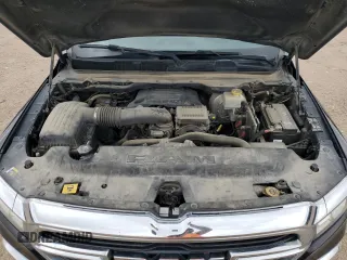 2021 Ram 1500 Big Horn z VIN 1C6RREFT4MN750643, wystawiony jako Copart lot #55787175 z przebiegiem 102 014 mil mil oraz Szkoda całkowita • Salvage title. Historia ofert i sprzedaży dostępna na DreamBid. Obrazek 11.