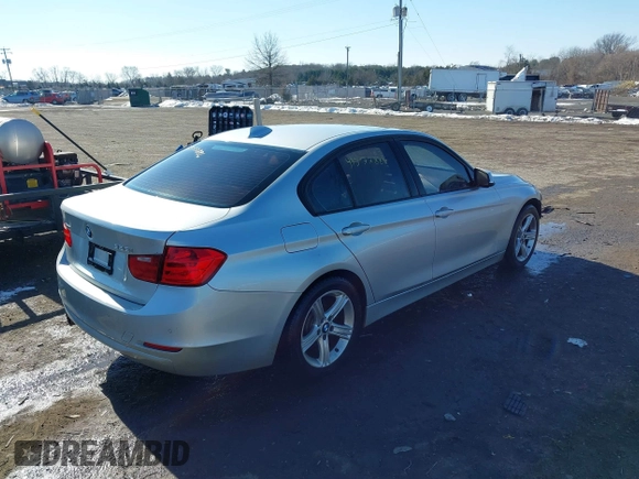 2013 BMW 3 Series 328i xDrive with VIN WBA3B5G51DNS05659, listed as a IAAI auction lot 41377886 with 159,972 mi miles. Bid and sale history available at carsss.com. Image 4.