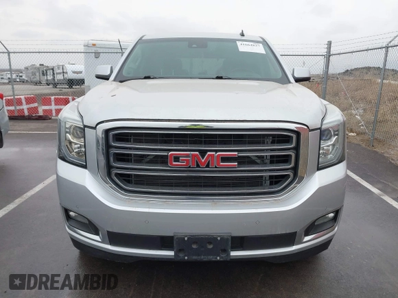 2015 GMC Yukon SLT with VIN 1GKS2BKCXFR131919, listed as a IAAI auction lot 41664827 with 149,398 mi miles. Bid and sale history available at carsss.com. Image 13.