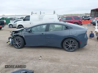 2024 Toyota Prius LE with VIN JTDACAAU8R3028529, listed as a IAAI auction lot 42079826 with 7,849 mi miles and . Bid and sale history available at DreamBid. Image 15.