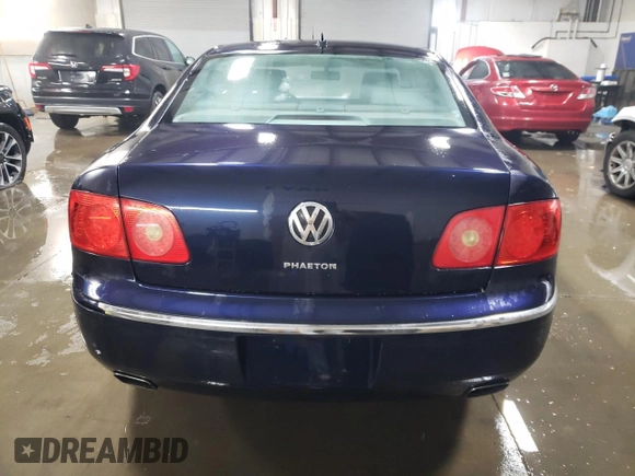 2004 Volkswagen Phaeton V8 z VIN WVWAF63D848008651, wystawiony jako Copart lot #78267004 z przebiegiem 146 193 mil mil oraz Szkody całkowita. Historia ofert i sprzedaży dostępna na DreamBid. Obrazek 6.