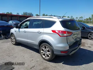 2016 Ford Escape Titanium with VIN 1FMCU0JX2GUC39416, listed as a IAAI auction lot 41793375 with 146,877 mi miles. Bid and sale history available at carsss.com. Image 3.
