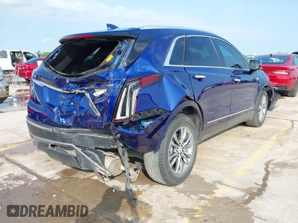 2023 Cadillac XT5 FWD Premium Luxury with VIN 1GYKNCRS4PZ151486, listed as a IAAI auction lot 42099826 with 42,274 mi miles and . Bid and sale history available at DreamBid. Image 4.
