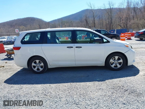 2015 Toyota Sienna L with VIN 5TDZK3DC3FS690484, listed as a IAAI auction lot 41888073 with 201,518 mi miles and . Bid and sale history available at carsss.com. Image 13.