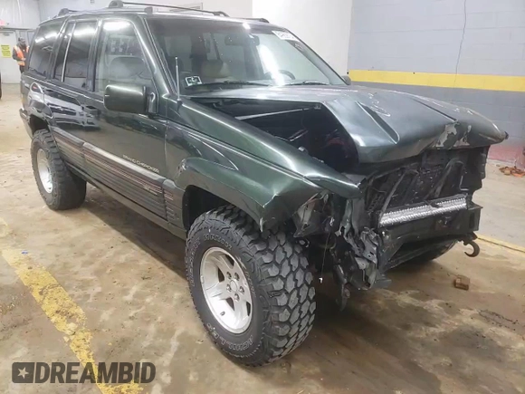 1995 Jeep Grand Cherokee Limited z VIN 1J4GZ78S7SC766726, wystawiony jako Copart lot #84909134 z przebiegiem 174 256 mil mil oraz Szkoda całkowita • Salvage title. Historia ofert i sprzedaży dostępna na DreamBid. Obrazek 12.
