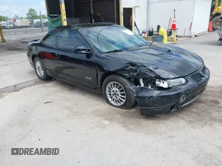 2001 Pontiac Grand Prix GTP z VIN 1G2WR12161F224789, wystawiony jako IAAI lot #42274536 z przebiegiem 125 098 mil mil oraz . Historia ofert i sprzedaży dostępna na DreamBid. Obrazek 1.