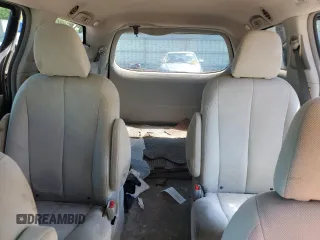 2012 Toyota Sienna with VIN 5TDZK3DC8CS198495, listed as a Copart auction lot 57335205 with 66,786 mi miles and Salvage title. Bid and sale history available at DreamBid. Image 10.
