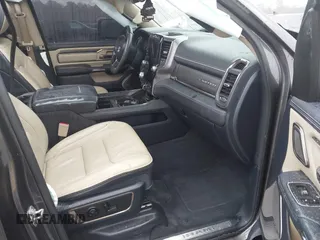2021 Ram 1500 Limited with VIN 1C6SRFHT4MN588369, listed as a IAAI auction lot 41553981 with 51,293 mi miles and . Bid and sale history available at DreamBid. Image 5.