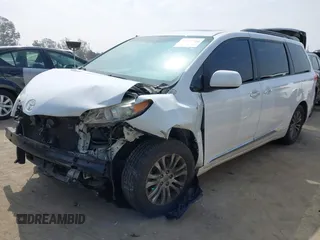 2014 Toyota Sienna XLE z VIN 5TDYK3DC7ES461445, wystawiony jako IAAI lot #42003360 z przebiegiem 153 404 mil mil oraz . Historia ofert i sprzedaży dostępna na DreamBid. Obrazek 19.
