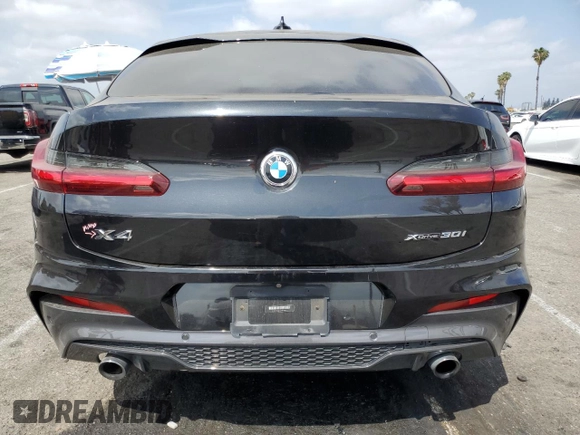 2020 BMW X4 xDrive30i z VIN 5UX2V1C0XL9B93562, wystawiony jako Copart lot #56180595 z przebiegiem 71 667 mil mil oraz Szkoda całkowita • Salvage title. Historia ofert i sprzedaży dostępna na DreamBid. Obrazek 6.