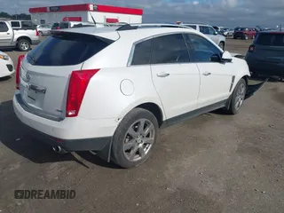 2012 Cadillac SRX Performance Collection with VIN 3GYFNBE34CS659748, listed as a IAAI auction lot 42693814 with 216,854 mi miles and . Bid and sale history available at DreamBid. Image 4.