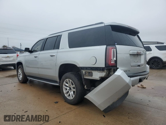 2016 GMC Yukon XL SLE with VIN 1GKS2FKC9GR178660, listed as a Copart auction lot 79937084 with 209,807 mi miles and Salvage Title. Bid and sale history available at DreamBid. Image 2.