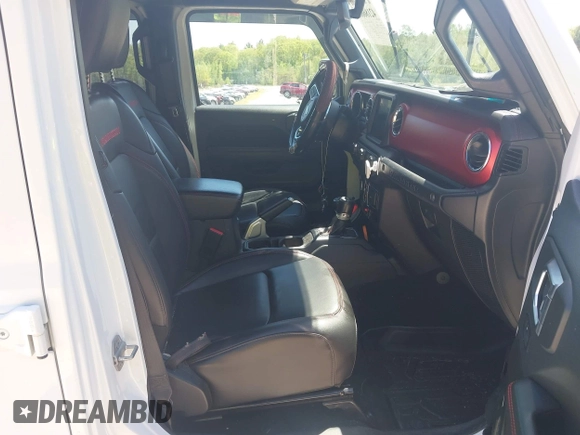 2021 Jeep Wrangler Unlimited Rubicon with VIN 1C4HJXFG5MW586842, listed as a IAAI auction lot 42186683 with 76,450 mi miles and . Bid and sale history available at DreamBid. Image 5.