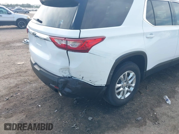 2021 Chevrolet Traverse LS z VIN 1GNERFKW7MJ169763, wystawiony jako IAAI lot #42041579 z przebiegiem 59 840 mil mil oraz . Historia ofert i sprzedaży dostępna na DreamBid. Obrazek 6.
