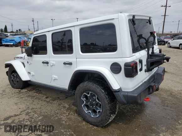 2023 Jeep Wrangler Rubicon with VIN 1C4HJXFG3PW691724, listed as a Copart auction lot 50985745 with 32,377 mi miles and Salvage title. Bid and sale history available at DreamBid. Image 2.