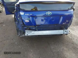2016 Toyota Prius Two with VIN JTDKBRFU6G3519581, listed as a IAAI auction lot 41662291 with 125,802 mi miles and . Bid and sale history available at carsss.com. Image 6.