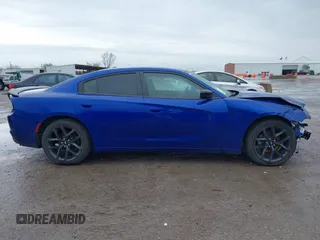 2019 Dodge Charger SXT with VIN 2C3CDXBGXKH748729, listed as a IAAI auction lot 41906272 with 76,816 mi miles. Bid and sale history available at carsss.com. Image 13.