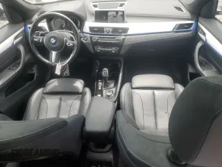 2021 BMW X1 xDrive28i with VIN WBXJG9C07M3M67312, listed as a Copart auction lot 59712835 with 62,371 mi miles and Salvage title. Bid and sale history available at DreamBid. Image 8.