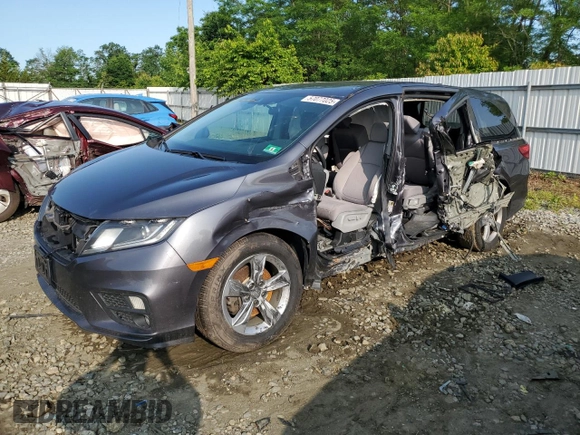 2019 Honda Odyssey EX with VIN 5FNRL6H58KB013889, listed as a Copart auction lot 57077025 with 126,467 mi miles and Salvage title. Bid and sale history available at DreamBid. Image 1.