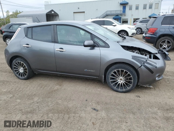 2015 Nissan LEAF S z VIN 1N4AZ0CP9FC321115, wystawiony jako Copart lot #57114655 z przebiegiem 157 924 mil mil oraz Szkoda całkowita • Salvage title. Historia ofert i sprzedaży dostępna na DreamBid. Obrazek 4.