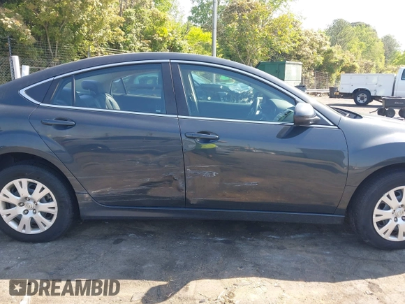 2012 Mazda 6 i Sport with VIN 1YVHZ8BH4C5M01305, listed as a IAAI auction lot 42032393 with 244,764 mi miles and . Bid and sale history available at DreamBid. Image 13.