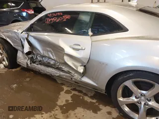 2014 Chevrolet Camaro LT z VIN 2G1FC1E31E9281774, wystawiony jako IAAI lot #41362956 z przebiegiem 144 936 mil mil oraz . Historia ofert i sprzedaży dostępna na DreamBid. Obrazek 6.