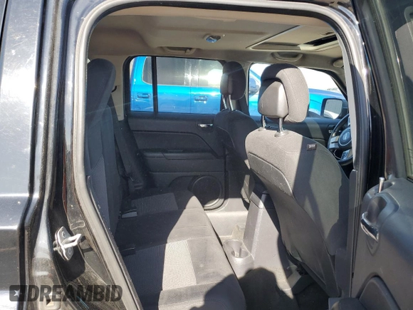2014 Jeep Patriot Latitude with VIN 1C4NJRFB5ED855888, listed as a Copart auction lot 57969355 with 113,196 mi miles and Salvage title. Bid and sale history available at DreamBid. Image 10.