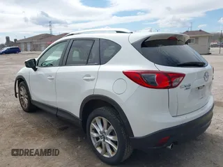 2014 Mazda CX-5 Grand Touring with VIN JM3KE4DY8E0397330, listed as a IAAI auction lot 41868116 with 180,891 mi miles. Bid and sale history available at carsss.com. Image 3.