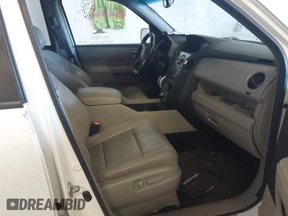 2010 Honda Pilot Touring with VIN 5FNYF4H95AB019903, listed as a IAAI auction lot 42196082 with 233,527 mi miles and . Bid and sale history available at carsss.com. Image 5.